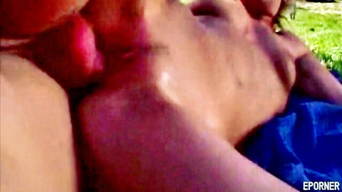Blonde MILF spreads legs for big red cock penetration outdoors on grass