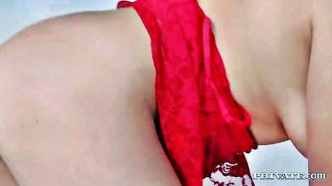Busty teen in sheer red lace lingerie bends over showing big ass and tits