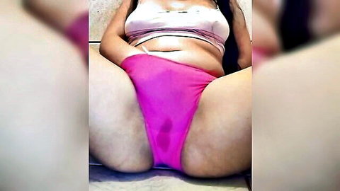 Thick Latina spreads thick thighs showing wet pink panties crotch in bathroom