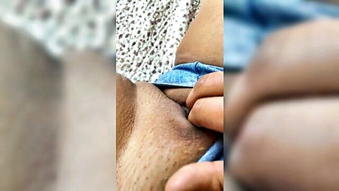 Latina amateur spreads hairy pussy lips wide open revealing big clit closeup