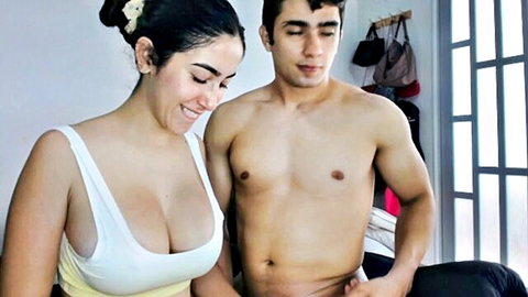 Saralia busty brunette in white tank top embraces shirtless fit guy