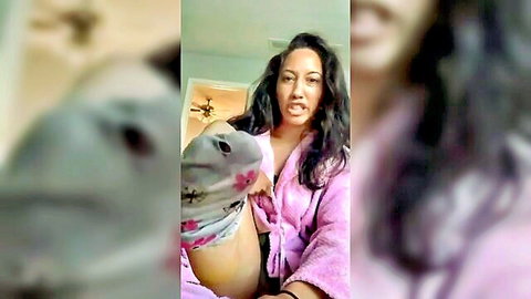 Curvy brunette in pink robe teases with gray socks and bare thigh, foot fetish solo