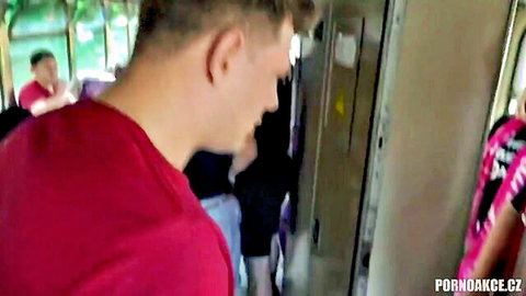 Amateur public tease on bus with man in red shirt and women in pink tops