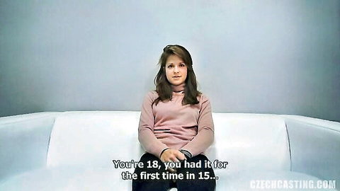 18-year-old brunette Dominika in amateur casting interview, sitting clothed