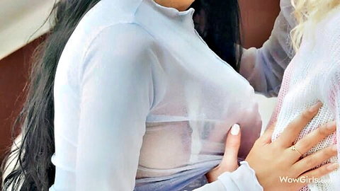 Isabella De Laa and Dulce in sheer white tops, intimate lesbian embrace