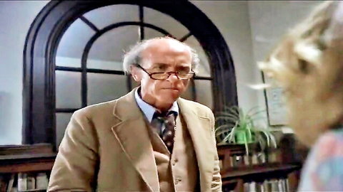 Vintage Debbie Does Dallas scene: older man in suit with young blonde woman, 1978 adult comedy