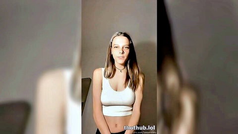 Ashley Matheson in tight white crop top during live stream outfit try-on tease