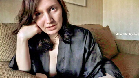 Bettie Bondage in open robe revealing cleavage, seductive mommy roleplay