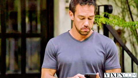 Fit muscular man in gray v-neck shirt checking phone outdoors VIXEN cuckold scene