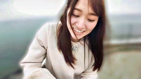 Busty Asian bus guide smiling in cozy coat outdoors, JAV style