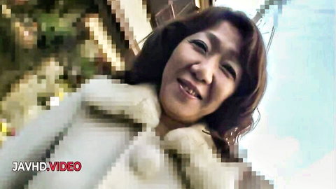 Smiling Japanese woman in white fur coat outdoors, JAV HD adult video thumbnail