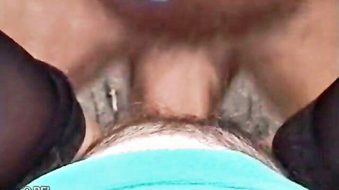 Close-up of mature granny's hairy pussy in black stockings