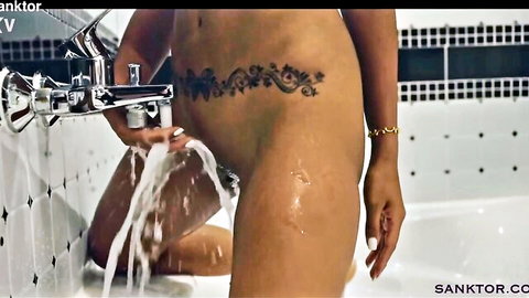 Tattooed Asian fitness babe teasing wet pussy in shower