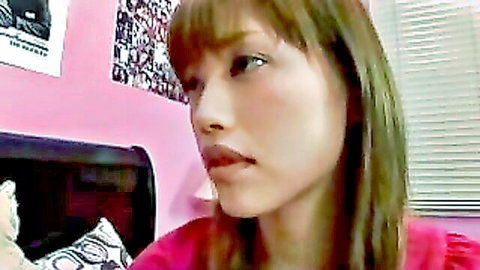 Seductive Asian woman with bangs in pink top, JAV bedroom tease