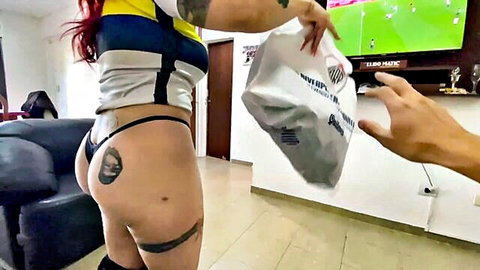 Argentine redhead Bostera in jersey and thong bends over, loses bet after soccer