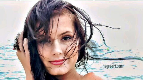 Teresa Brown wet-haired beauty smiling on beach