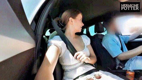 Hermione Potter lookalike in white dress during car ride vlog in Italy
