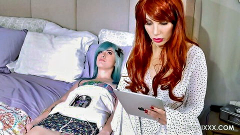 Ashley Fires in kinky lesbian scene with bound teal-haired partner