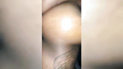 Blurry close-up of nude woman with wing tattoo riding pussy to orgasm