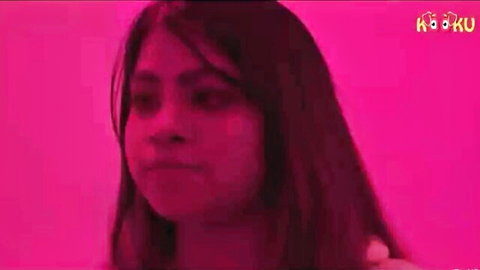 Indian beauty with long dark hair in pink lighting from Golden Hol Kooku series