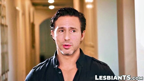Handsome man with open shirt speaking in elegant hallway on LESBIANTANTS.com