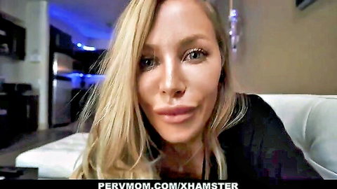 Nicole Aniston blonde MILF in black top seductive close-up