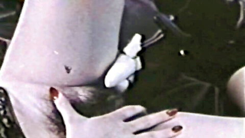 Vintage solo female close-up masturbation with white dildo and hairy pussy