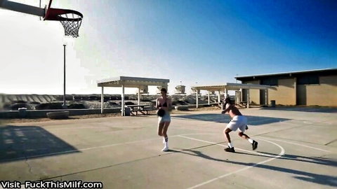 Chloe Foxxe in sporty shorts plays basketball with hung James Angel outdoors