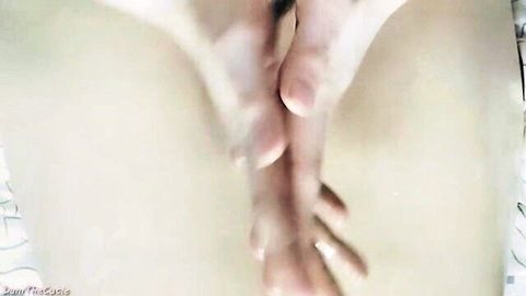 DaniTheCutie oils her feet in sensual trans JOI tease