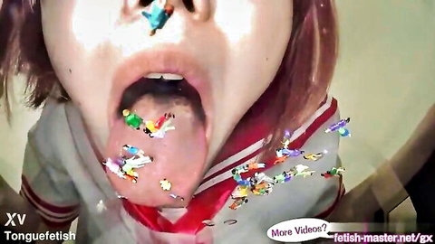 Japanese schoolgirl giantess vore fetish tease with open mouth and colorful tongue specks