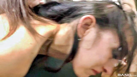 Two young sexy brunettes embracing intimately in MMF threesome