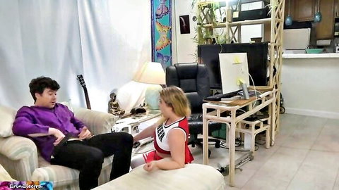 Blonde cheerleader in tiny skirt teases stepdad on couch in taboo scene