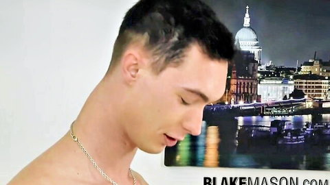 British twunk shirtless side profile with London skyline, teasing anal fun after blowjob