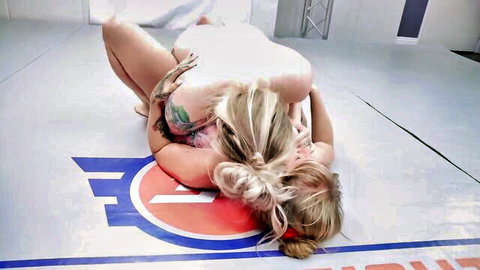 Kaiia Eve grapples Madison Sky in lesbian wrestling submission hold