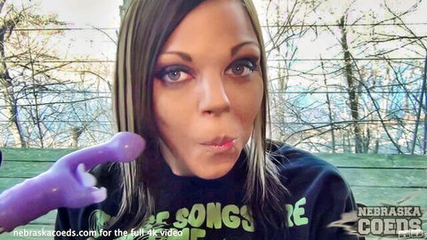 Trinity teases with purple dildo near Cedar River, outdoor amateur solo