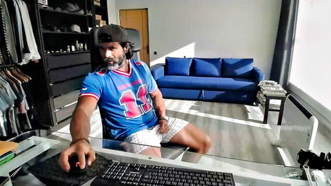Handsome Latino man Latino23bom in sexy blue jersey, teasing selfsuck pose