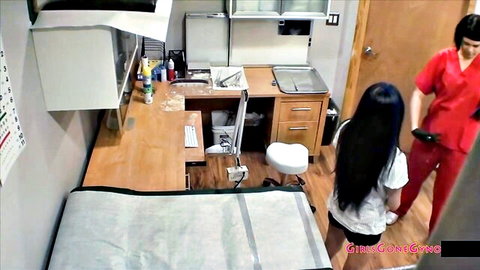 Nurse in red uniform examines long-haired Asian girl in clinic - Little Mina porn thumbnail