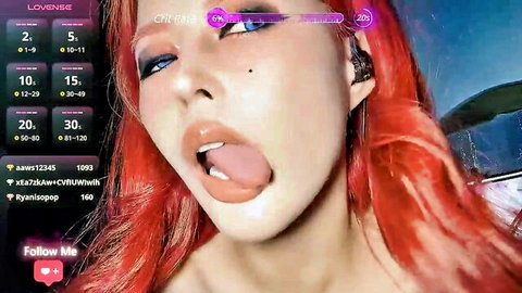 Reaowna redhead with blue eyes sticking out tongue in seductive webcam close-up