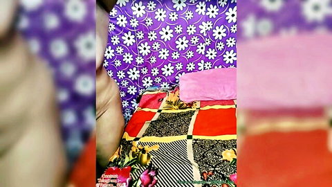 Chubby amateur woman lounging on colorful bed in vibrant bedroom