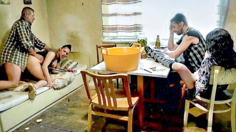 Twisted family group sex scene with insertion on couch, others watching