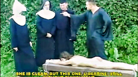Brunette with big ass spanked hard by nuns in fetish scene