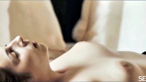 Sweet Angelina nude topless, hypnotized gaze in SexArt scene