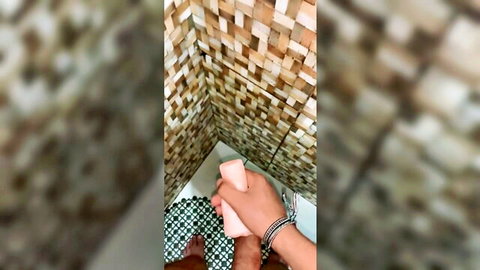 Magrinho Capixaba testing pink toy in bathroom, solo male amateur play