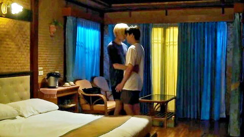 Intimate shirtless embrace between two slim Asian men in boys love scene
