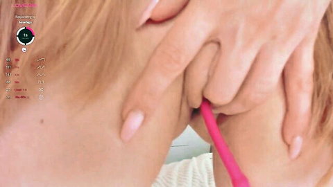 Blonde camgirl britakiss masturbating with pink dildo in orgasm show