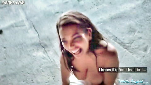Topless tanned brunette babe with huge hanging tits smiles squatting outdoors on wet concrete