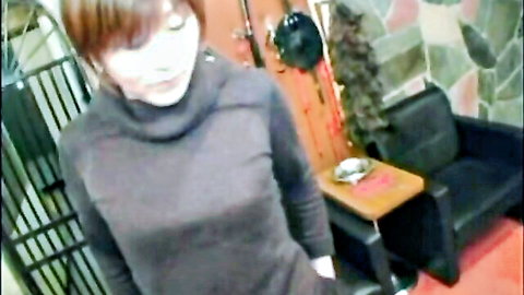 Japanese woman in tight turtleneck sweater, seductive side glance in obedience JAV scene