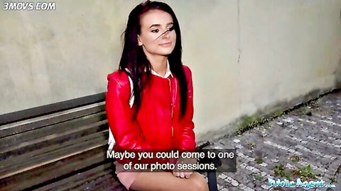 Kate Rich in red leather jacket on outdoor bench, inviting to photo session