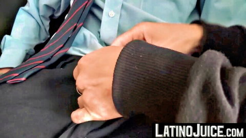 Latino dude in blue shirt and red tie gets handjob on his big hard cock by hooded guy.