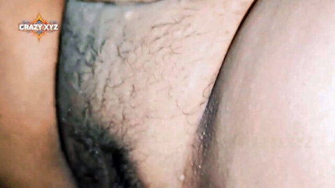 Hairy scrotum pressed tight against smooth pale ass cheeks closeup
